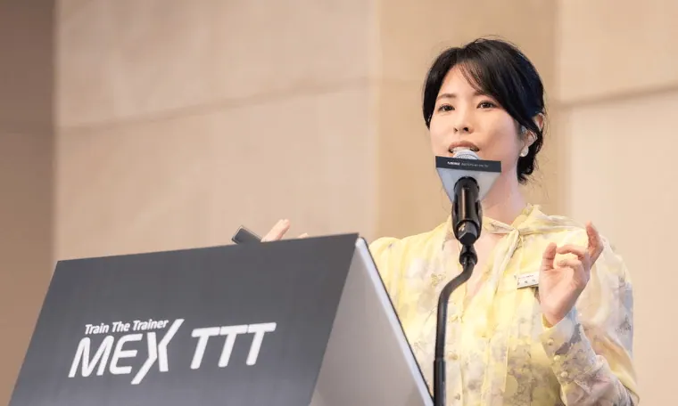 Dr. Yu teaching at a train-the-trainer session
